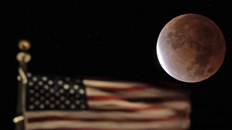 Blood moon: photographer captures rare event from city streets